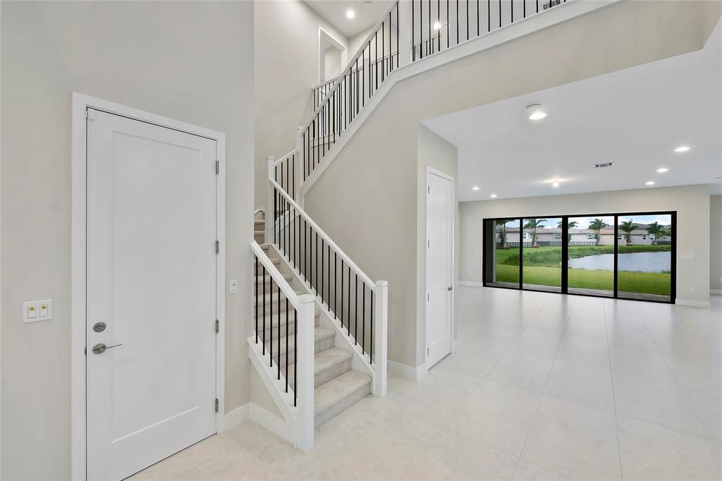 20119 Pacific Dunes Drive Boca Raton, FL 33434 - Photo 11 of 52 a view of an entryway with staircase