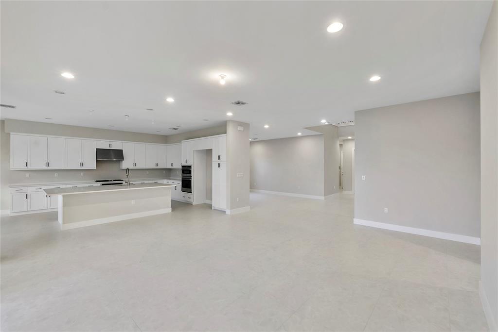 20119 Pacific Dunes Drive Boca Raton, FL 33434 - Photo 15 of 52 a view of kitchen with refrigerator sink and stove