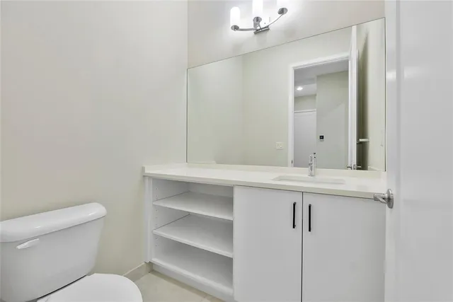 a view of an empty room with a large window