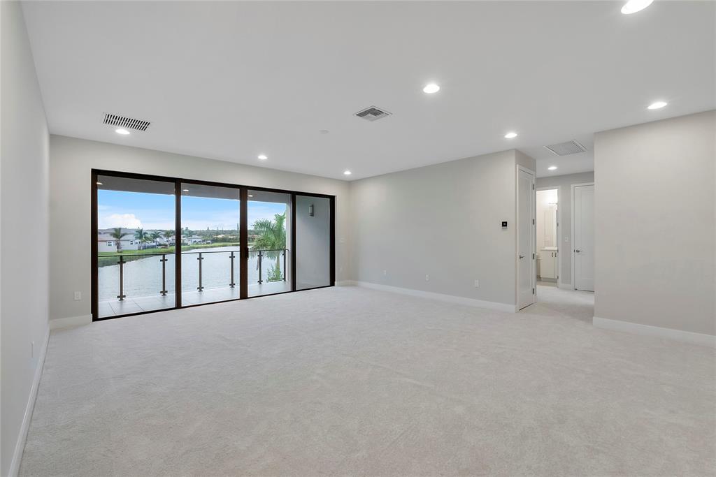20119 Pacific Dunes Drive Boca Raton, FL 33434 - Photo 19 of 52 a view of an empty room with a large window