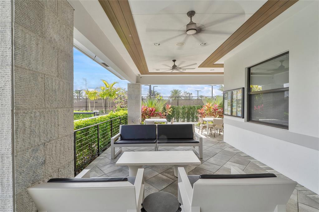 20119 Pacific Dunes Drive Boca Raton, FL 33434 - Photo 49 of 52 a living room with large window