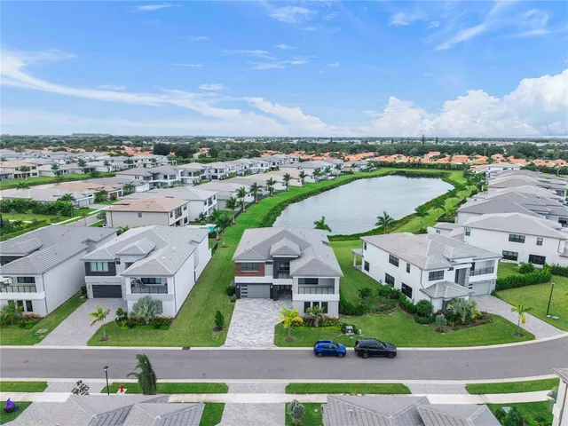 an aerial view of a house with a garden
