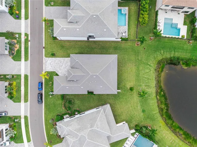 an aerial view of a house with a garden