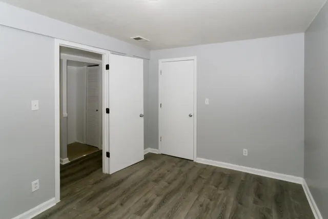 a view of entryway with wooden floor