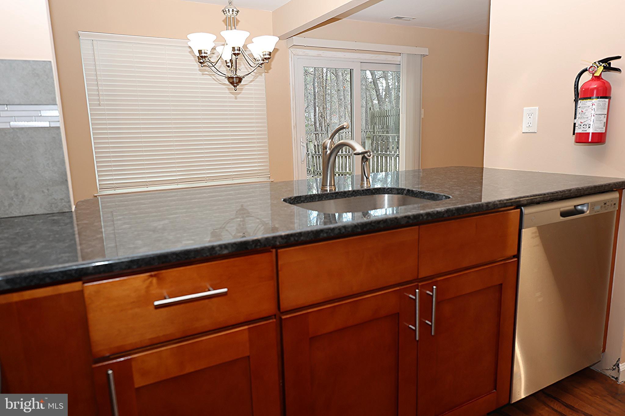 13 Five Crown Royal Marlton, NJ 08053 - Photo 14 of 31 a view of a room with wooden floor and a window