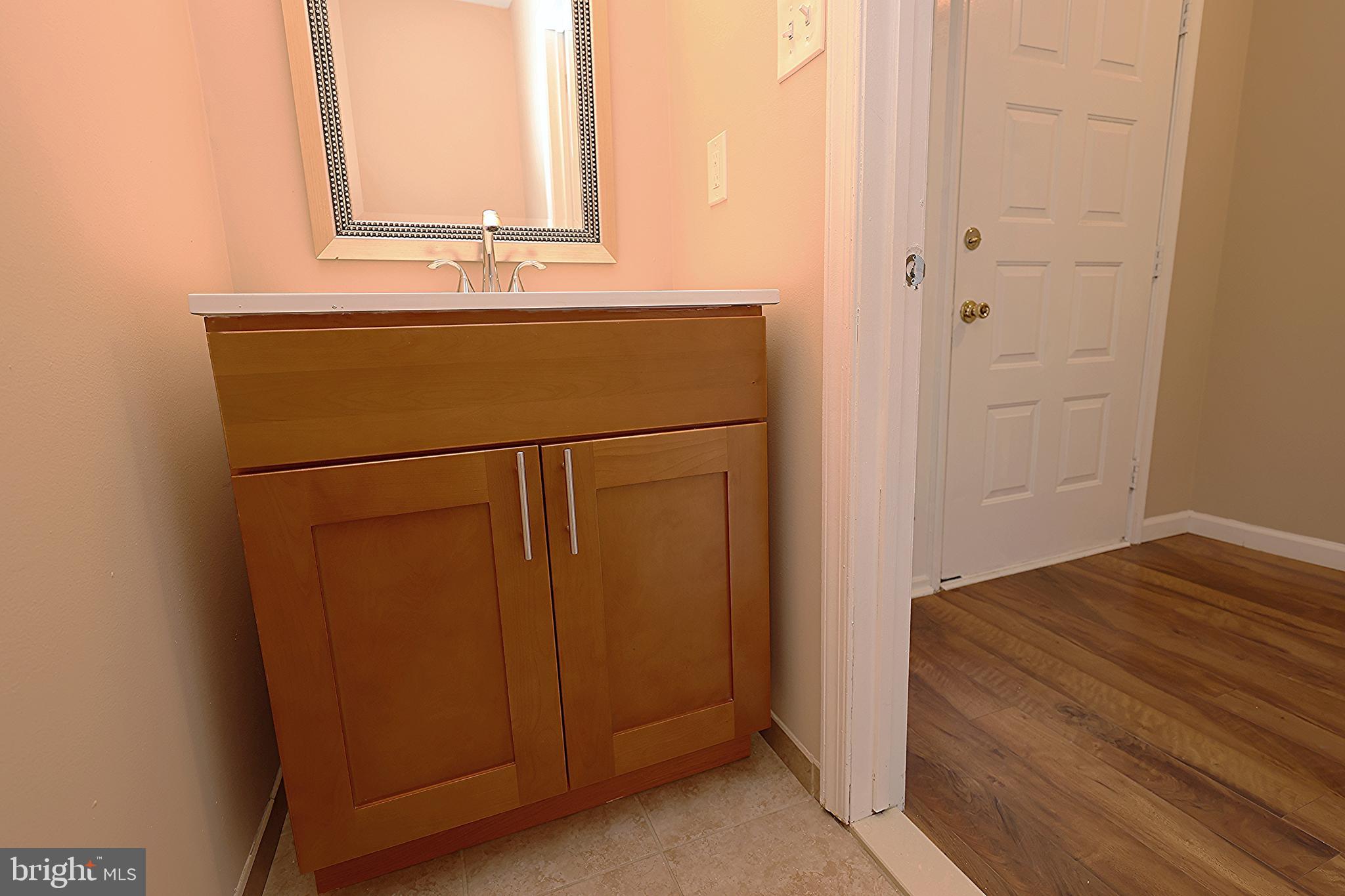 13 Five Crown Royal Marlton, NJ 08053 - Photo 17 of 31 a bathroom with a sink and a mirror
