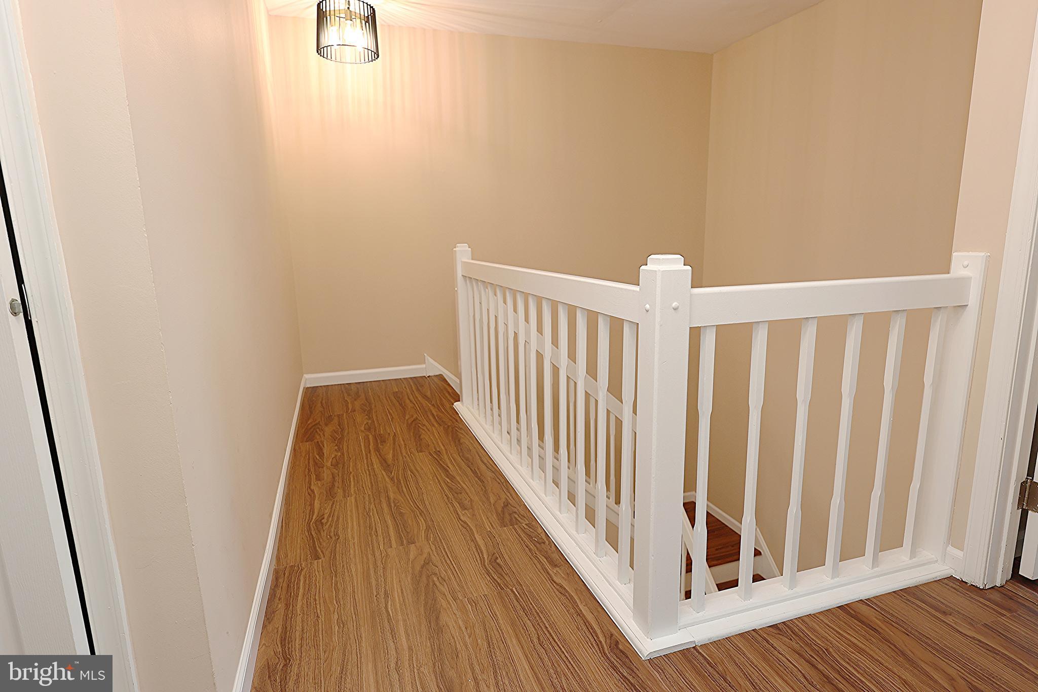 13 Five Crown Royal Marlton, NJ 08053 - Photo 18 of 31 a view of a hallway with wooden floor