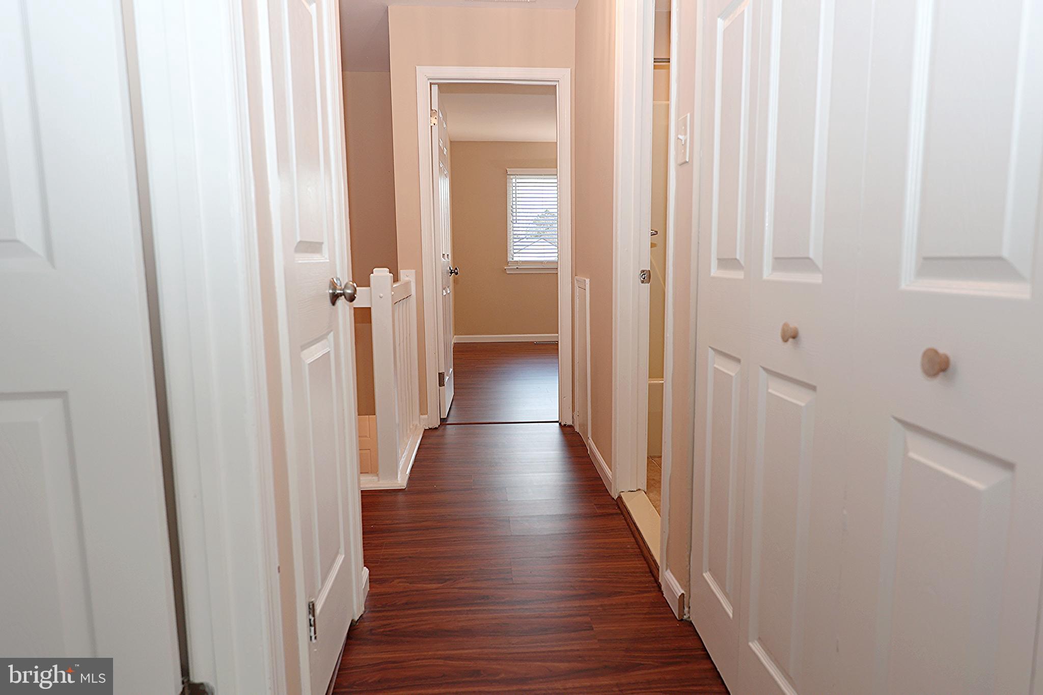 13 Five Crown Royal Marlton, NJ 08053 - Photo 19 of 31 a view of a hallway with wooden floor