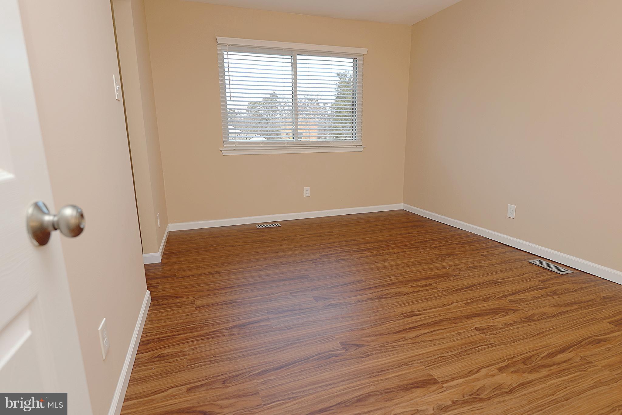 13 Five Crown Royal Marlton, NJ 08053 - Photo 21 of 31 an empty room with wooden floor and windows