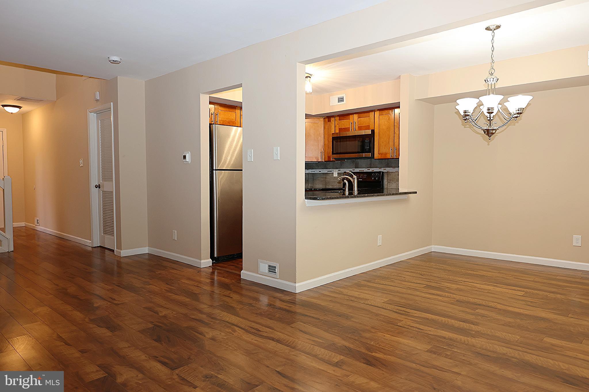 13 Five Crown Royal Marlton, NJ 08053 - Photo 10 of 31 a view of a room with wooden floor and chandelier