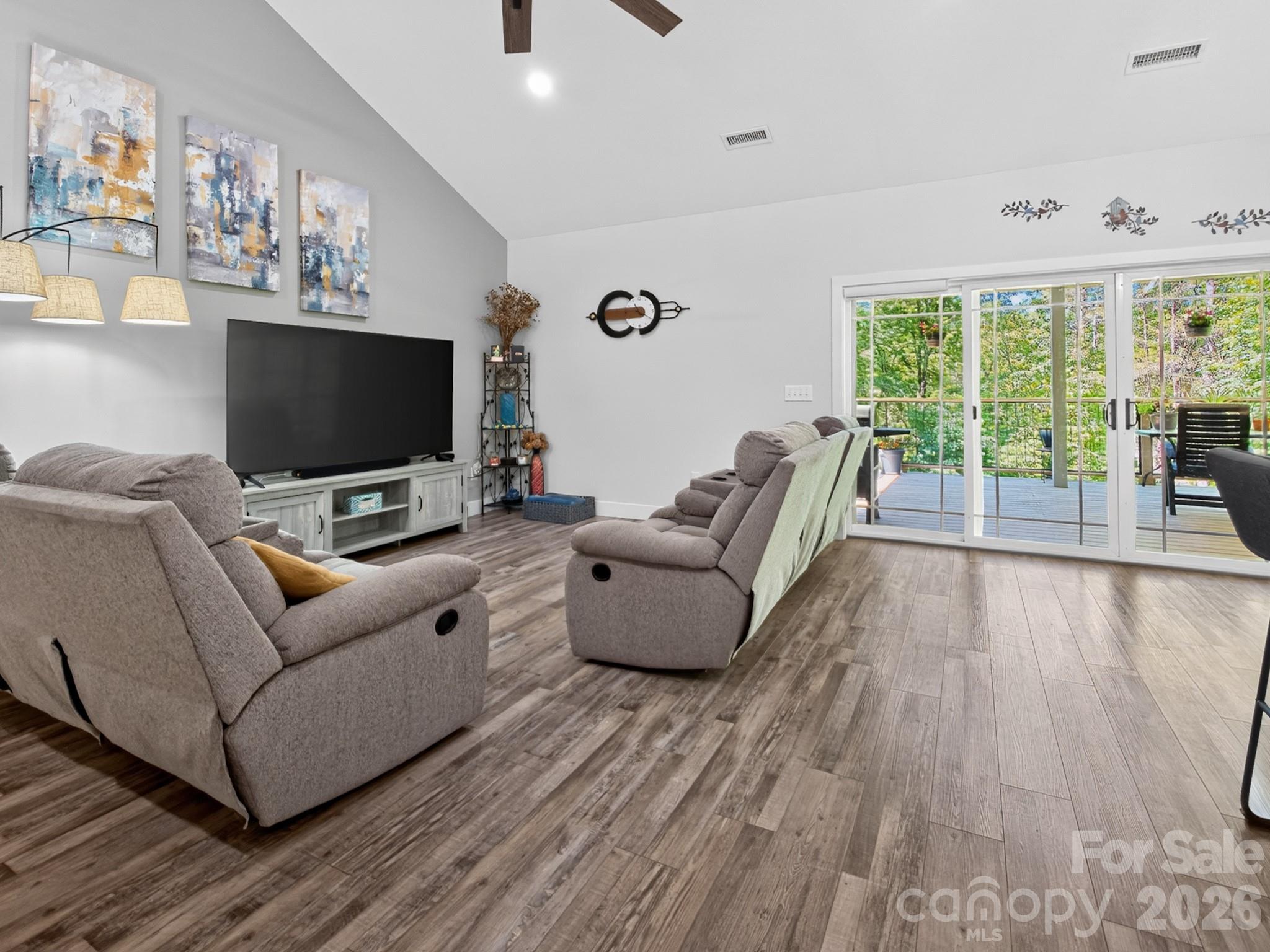 278 Hunters Trace Rutherfordton, NC 28139 - Photo 18 of 33 a living room with furniture and a flat screen tv