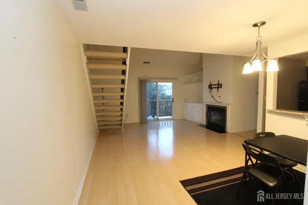 a view of a livingroom with a fireplace