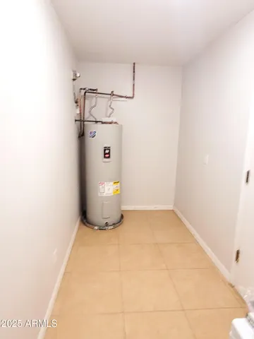 a view of a livingroom with storage and utility