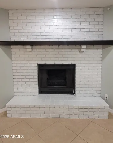 a fireplace with granite table