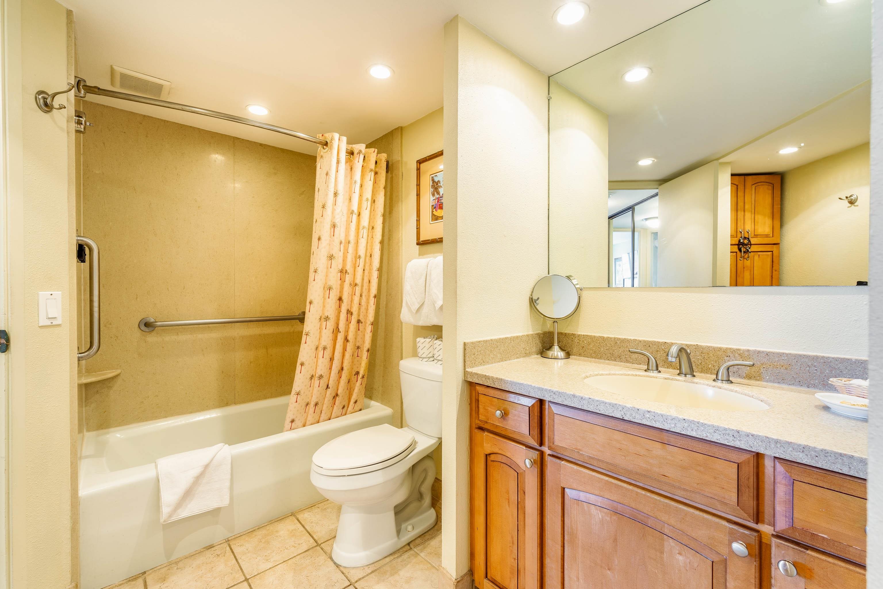 3445 Lower Honoapiilani Road, Unit 905 Lahaina, HI 96761 - Photo 19 of 30 a bathroom with a granite countertop sink toilet and shower