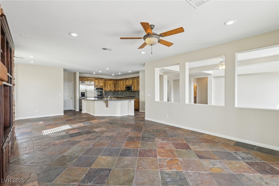 6188 Windfresh Drive Las Vegas, NV 89148 - Photo 17 of 94 View of family room towards the kitchen.