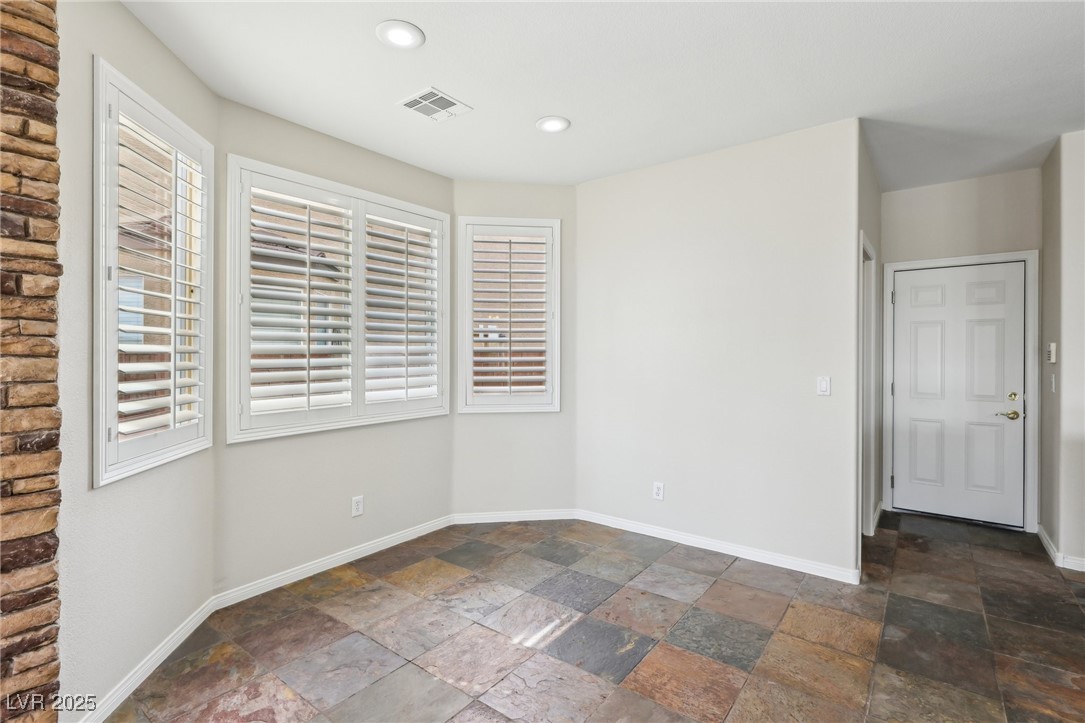 6188 Windfresh Drive Las Vegas, NV 89148 - Photo 18 of 94 Breakfast nook off of the kitchen and family room.