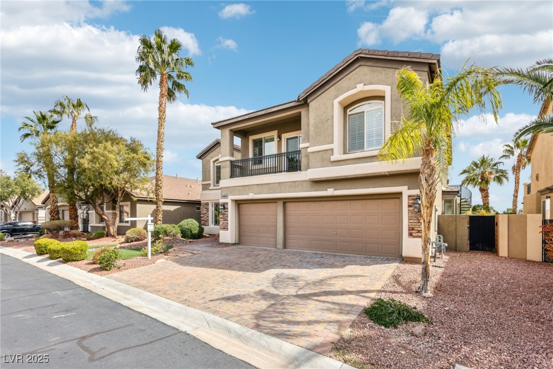 6188 Windfresh Drive Las Vegas, NV 89148 - Photo 2 of 94 View of front of house with stucco siding, decorat