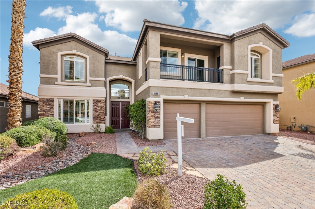 6188 Windfresh Drive Las Vegas, NV 89148 - Photo 4 of 94 Mediterranean / spanish-style home with a garage,