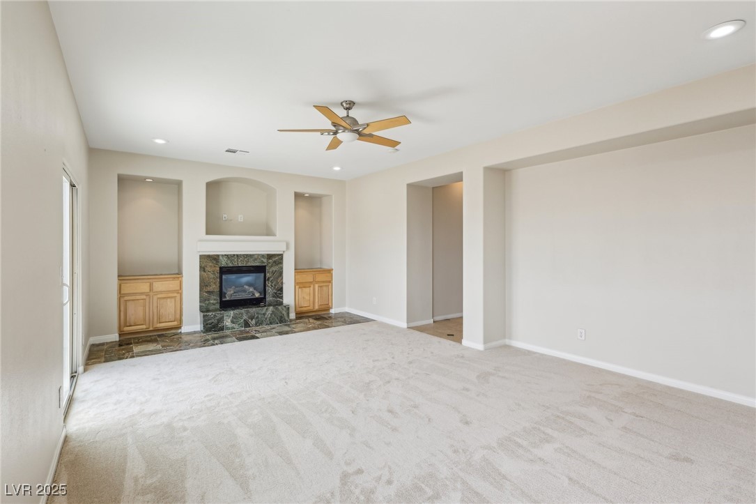 6188 Windfresh Drive Las Vegas, NV 89148 - Photo 46 of 94 Primary bedroom featuring a green marble surround