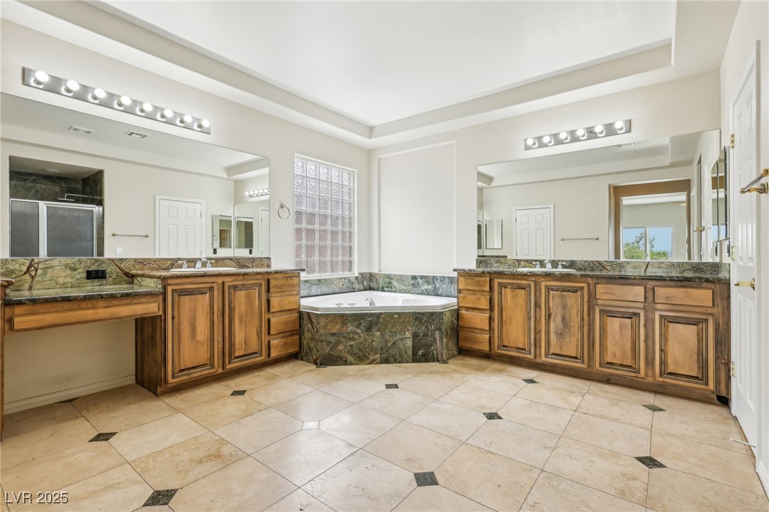6188 Windfresh Drive Las Vegas, NV 89148 - Photo 53 of 94 Primary bathroom featuring tile patterned floors,
