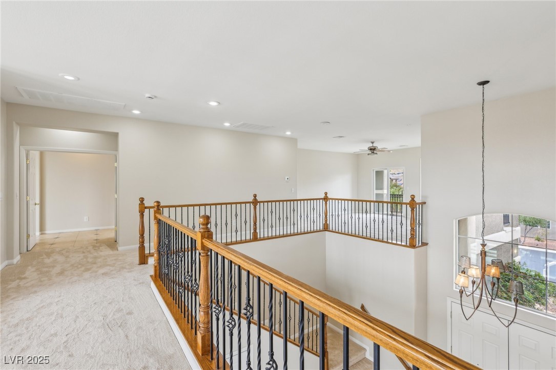 6188 Windfresh Drive Las Vegas, NV 89148 - Photo 63 of 94 View of the primary bedroom suite doors with loft