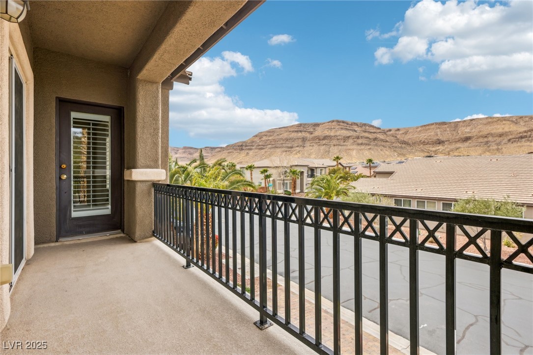 6188 Windfresh Drive Las Vegas, NV 89148 - Photo 66 of 94 Front balcony with beautiful mountain views.