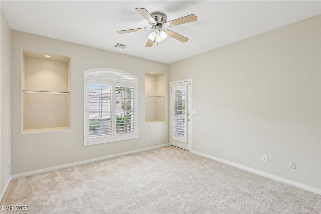 6188 Windfresh Drive Las Vegas, NV 89148 - Photo 72 of 94 Bedroom with door to front balcony.