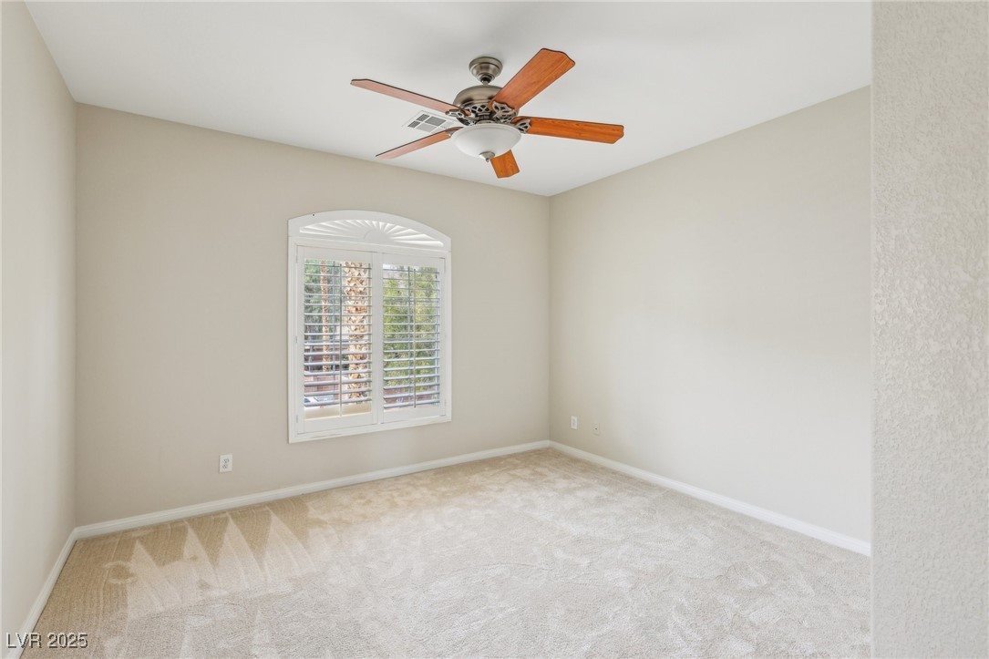 6188 Windfresh Drive Las Vegas, NV 89148 - Photo 80 of 94 Upstairs bedroom at front of home.
