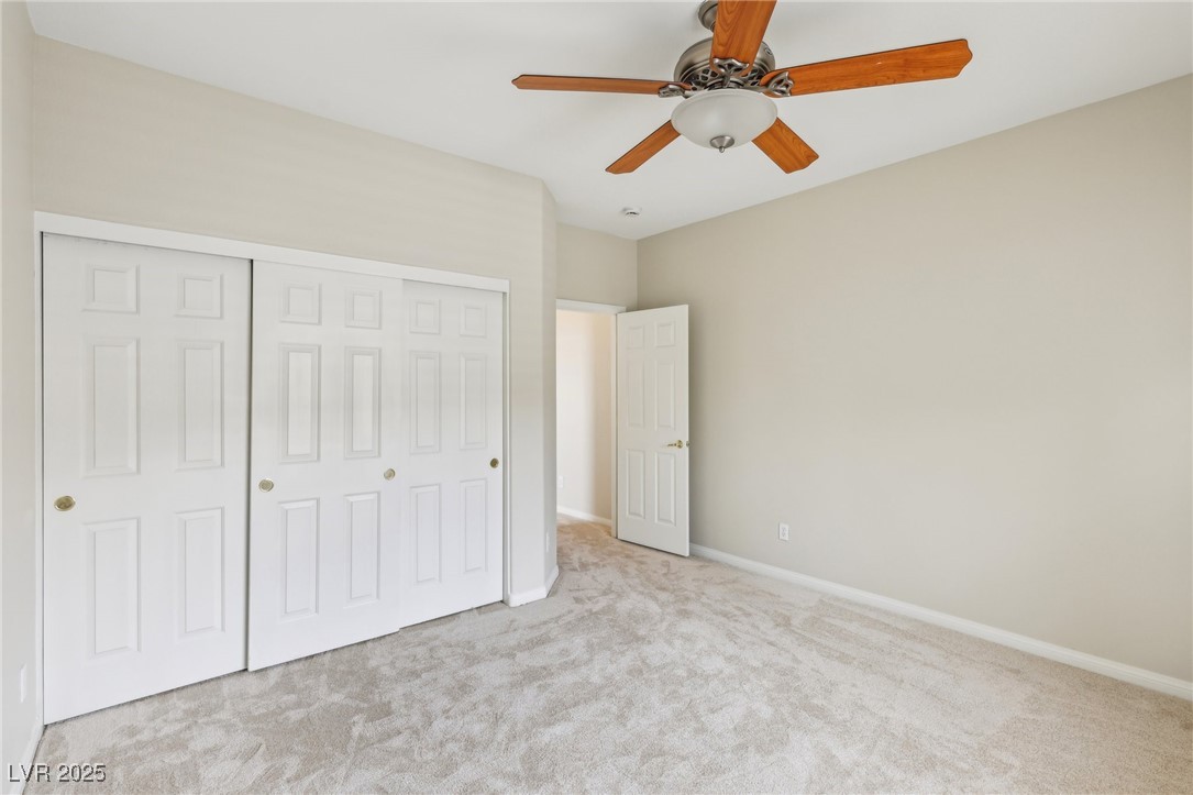 6188 Windfresh Drive Las Vegas, NV 89148 - Photo 82 of 94 Upstairs bedroom at front of the home with large w