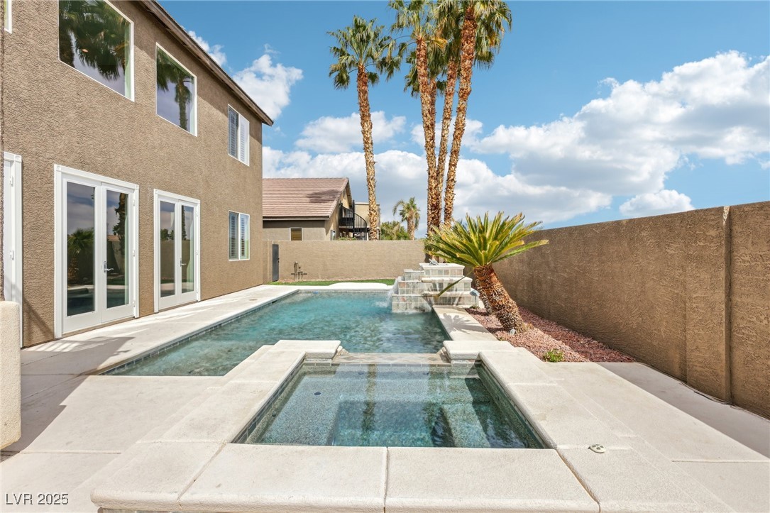 6188 Windfresh Drive Las Vegas, NV 89148 - Photo 86 of 94 View of raised spa featuring a waterfall edge.