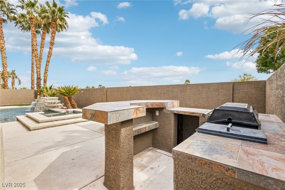 6188 Windfresh Drive Las Vegas, NV 89148 - Photo 88 of 94 Built-in BBQ/bar feature