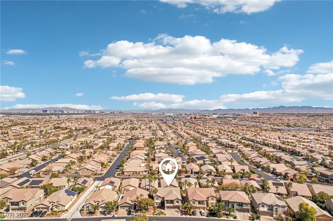 6188 Windfresh Drive Las Vegas, NV 89148 - Photo 91 of 94 Drone/aerial view featuring a strip and mountain v