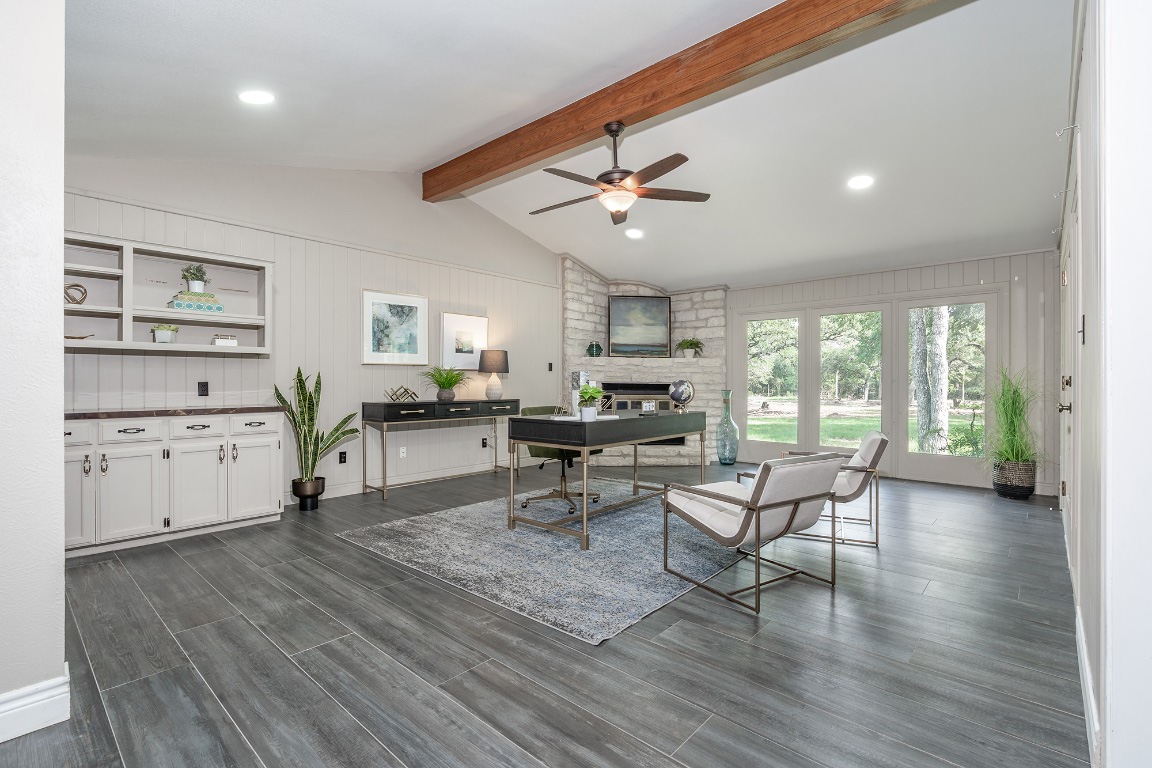 444 Logan Ranch Road Georgetown, TX 78628 - Photo 14 of 36 a living room with furniture and wooden floor