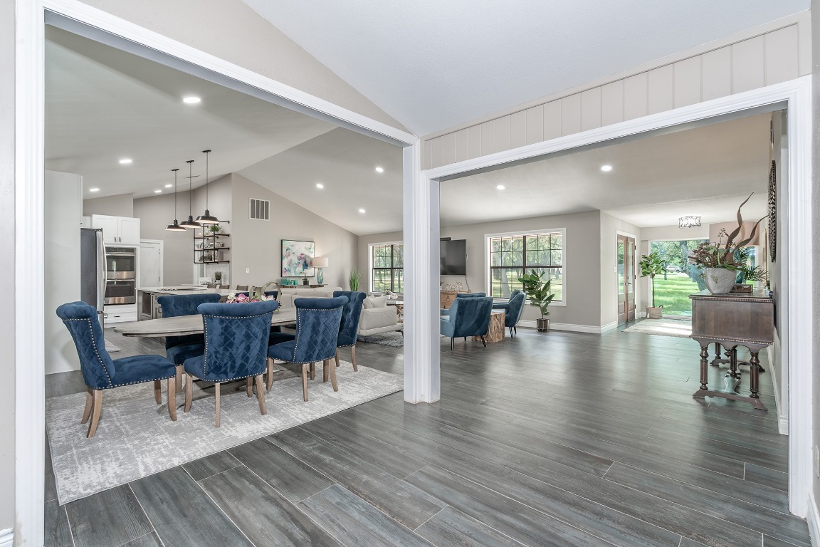 444 Logan Ranch Road Georgetown, TX 78628 - Photo 7 of 36 a view of a dining room and livingroom with lots of furniture