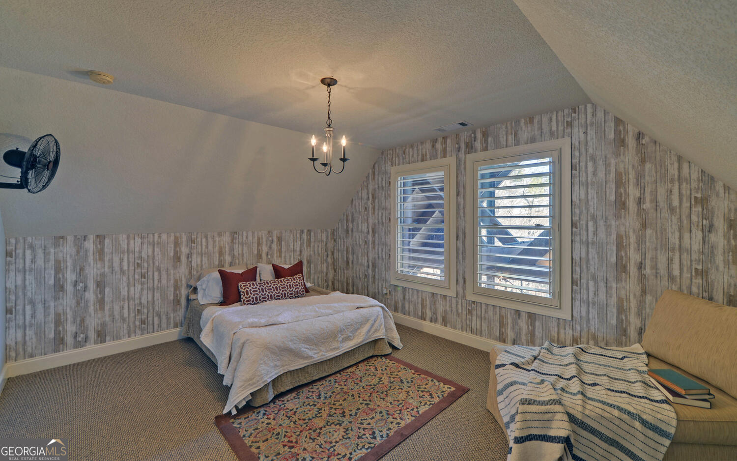 60 Browns Lane Hartwell, GA 30643 - Photo 39 of 89 a bedroom with a bed and wooden floor