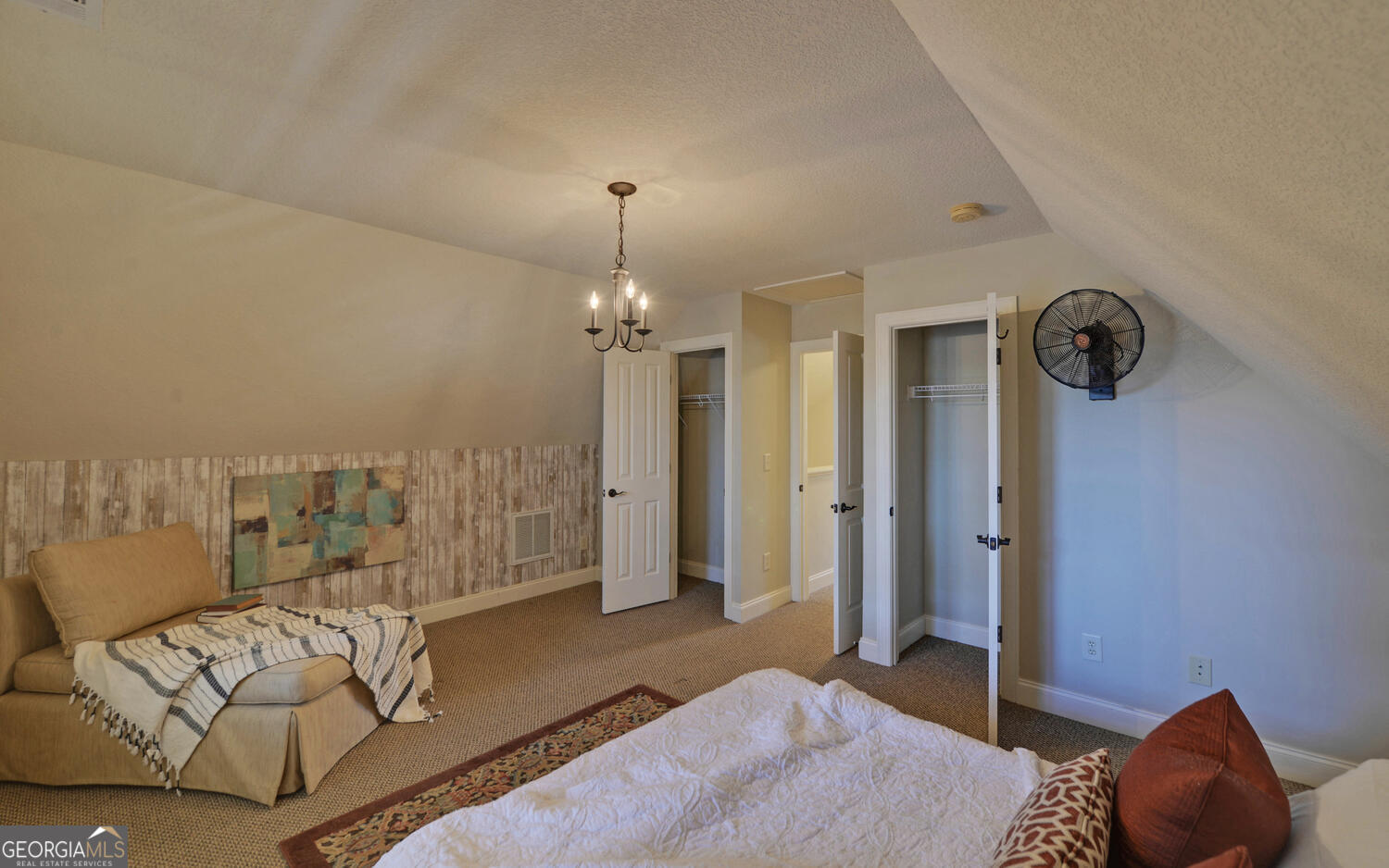 60 Browns Lane Hartwell, GA 30643 - Photo 40 of 89 a spacious bedroom with a bed and a chair