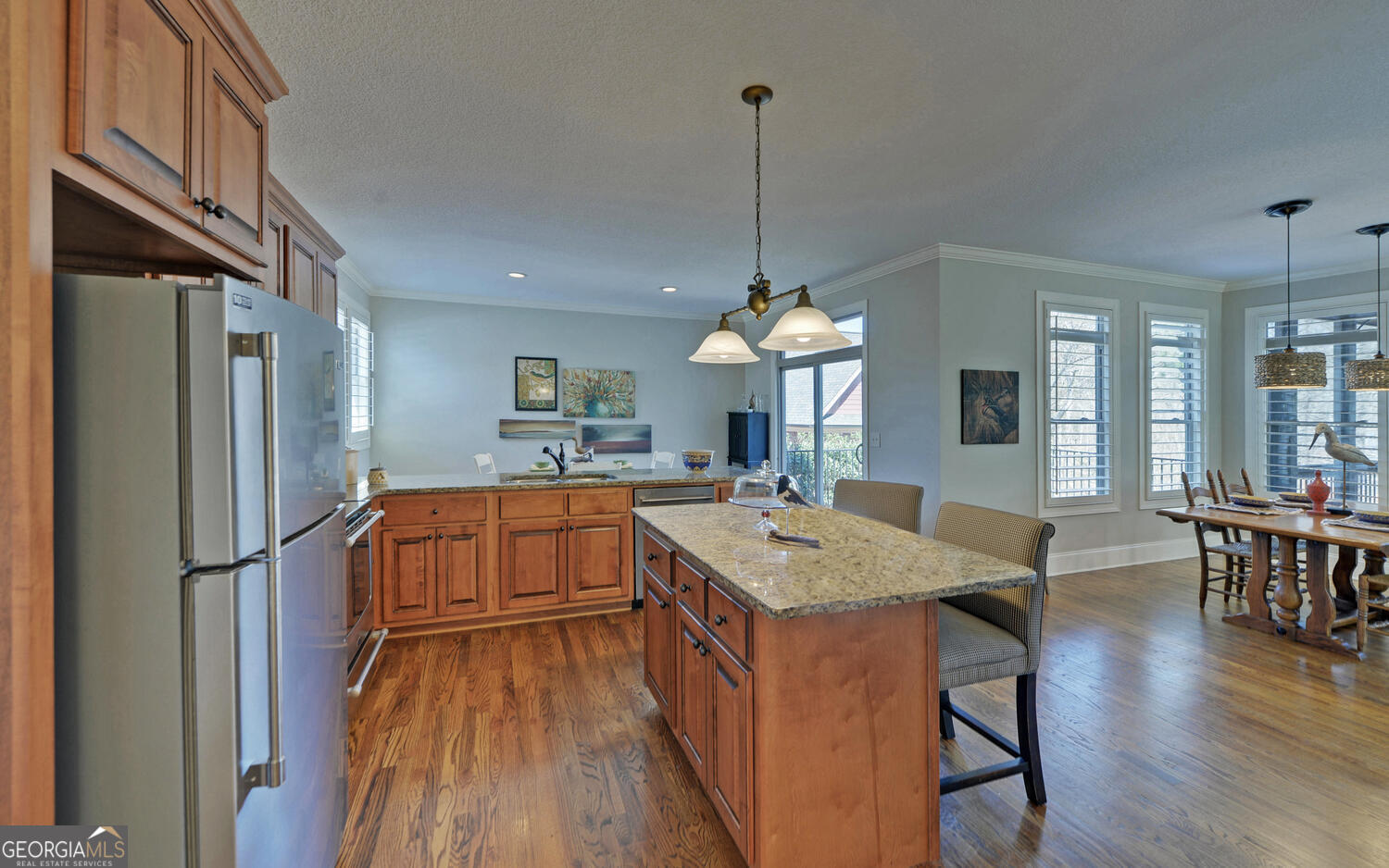 60 Browns Lane Hartwell, GA 30643 - Photo 7 of 89 a kitchen with stainless steel appliances granite countertop a refrigerator a sink dishwasher a stove and a dining table with wooden floor