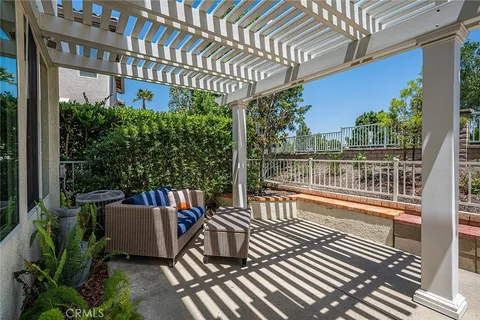 a view of a chairs and tables on the terrace