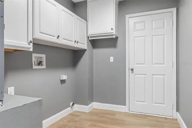 a view of a kitchen with marble wall and entryway