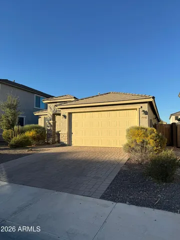 a view of a house with a street