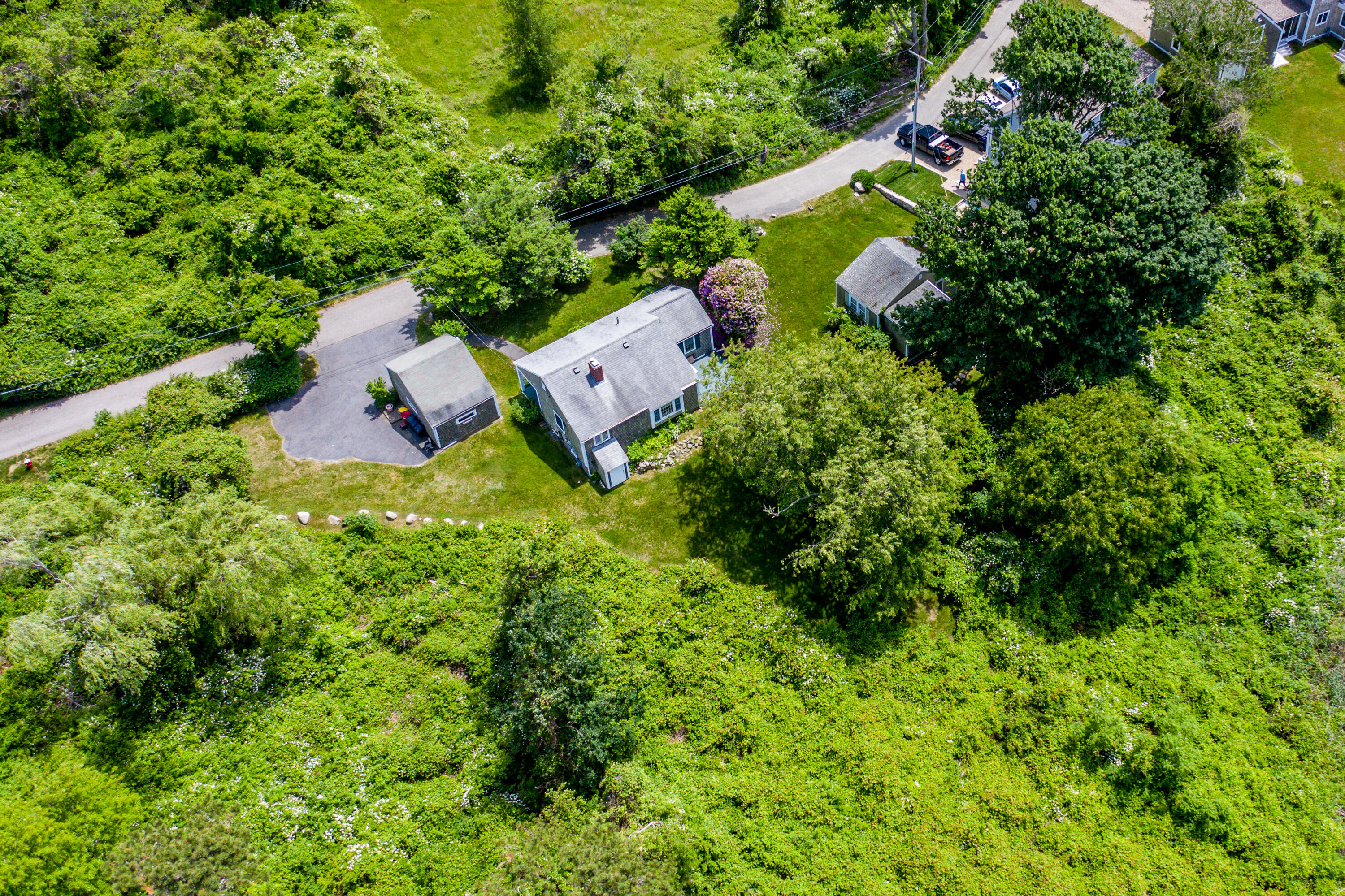 205 Stoney Point Road Cummaquid, MA 02675 - Photo 21 of 24 an aerial view of a house with a yard