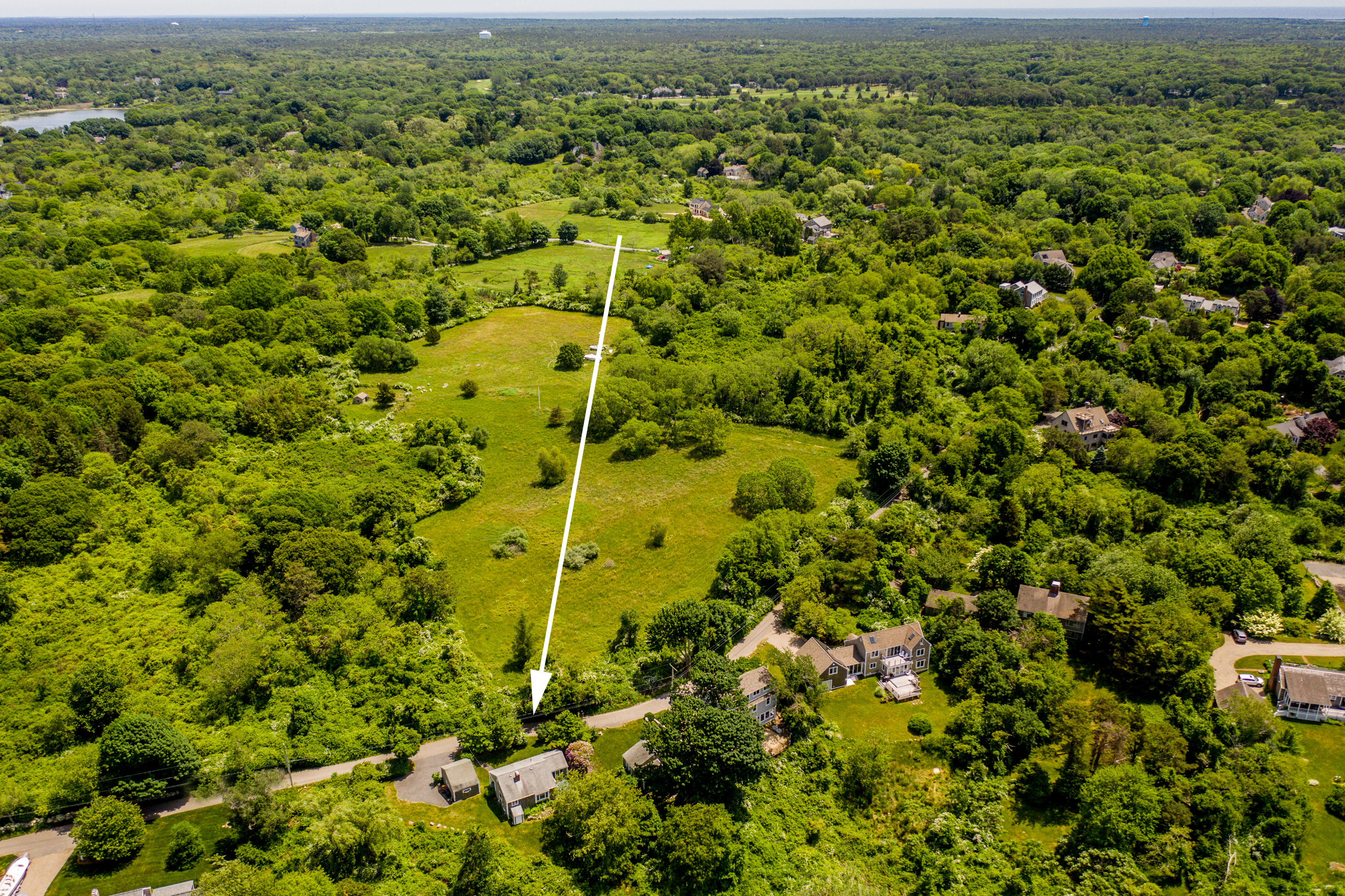 205 Stoney Point Road Cummaquid, MA 02675 - Photo 23 of 24 an aerial view of residential houses with outdoor space and trees