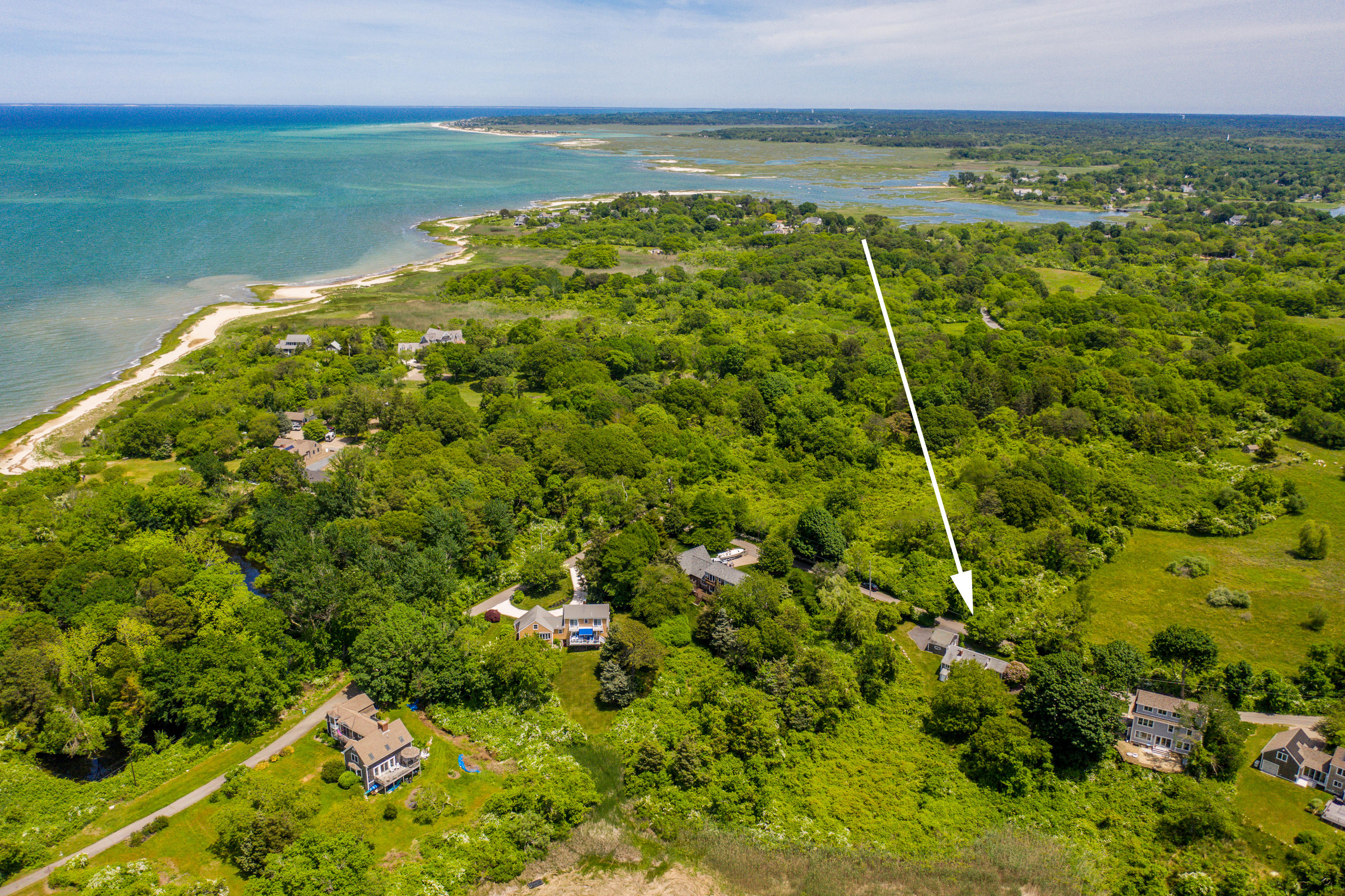 205 Stoney Point Road Cummaquid, MA 02675 - Photo 24 of 24 a view of a field with an ocean