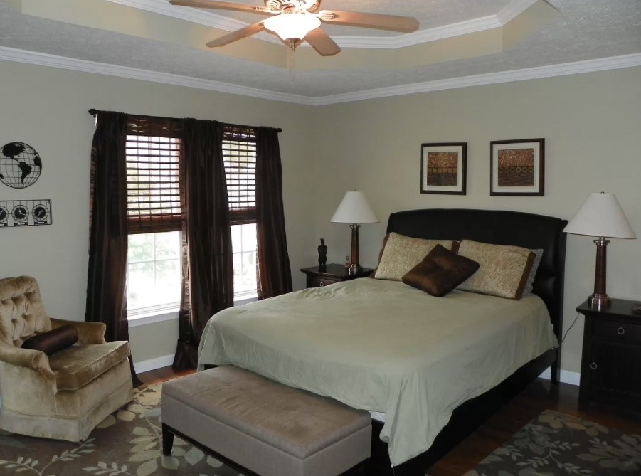 1345 Bell Road, Unit 312 Antioch, TN 37013 - Photo 5 of 7 a bedroom with a bed and a couch