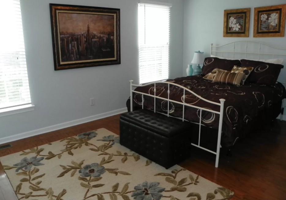 1345 Bell Road, Unit 312 Antioch, TN 37013 - Photo 7 of 7 a bed sitting in a bedroom next to a window