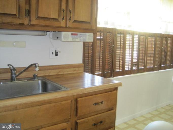 6621 Edsall Road Springfield, VA 22151 - Photo 2 of 5 a view closed with granite countertop a sink
