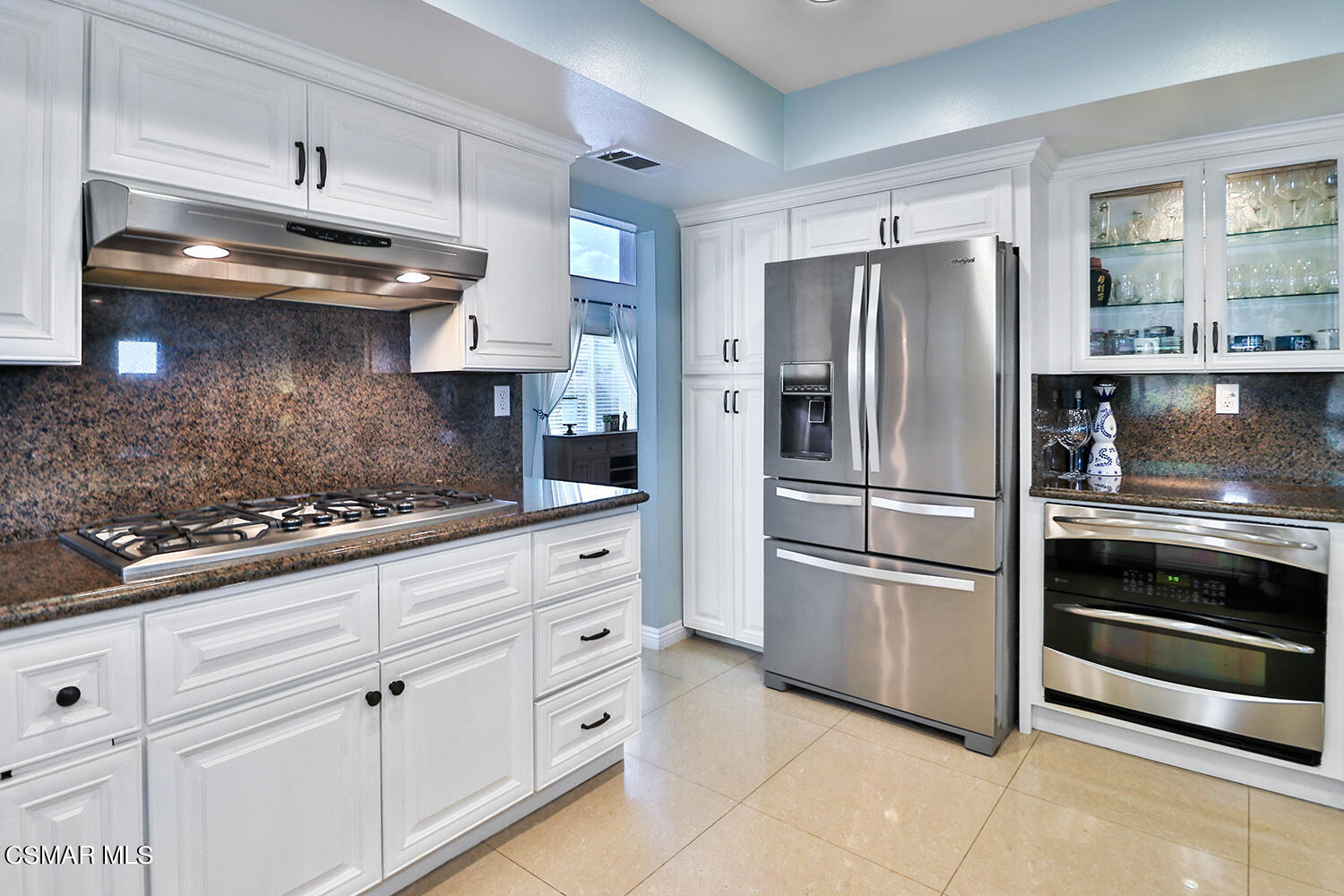 3053 Bianca Circle Simi Valley, CA 93063 - Photo 21 of 73 a kitchen with stainless steel appliances granite countertop a refrigerator and a stove