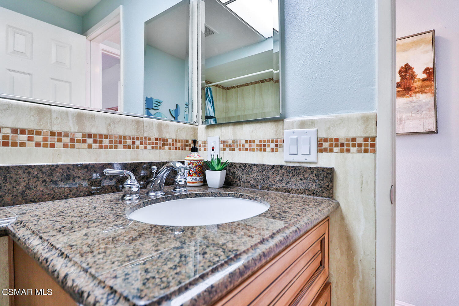 3053 Bianca Circle Simi Valley, CA 93063 - Photo 33 of 73 a bathroom with a sink and a mirror