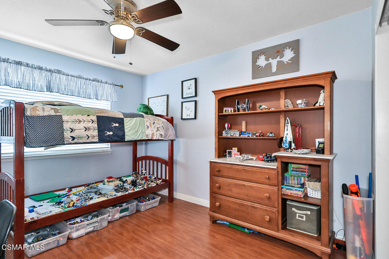 3053 Bianca Circle Simi Valley, CA 93063 - Photo 44 of 73 a bedroom with furniture and a baby crib